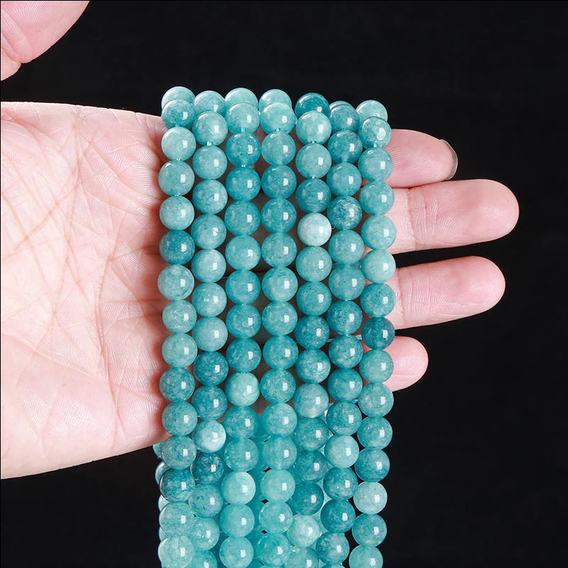 Perles en vrac d'Aigue-Marine teintée