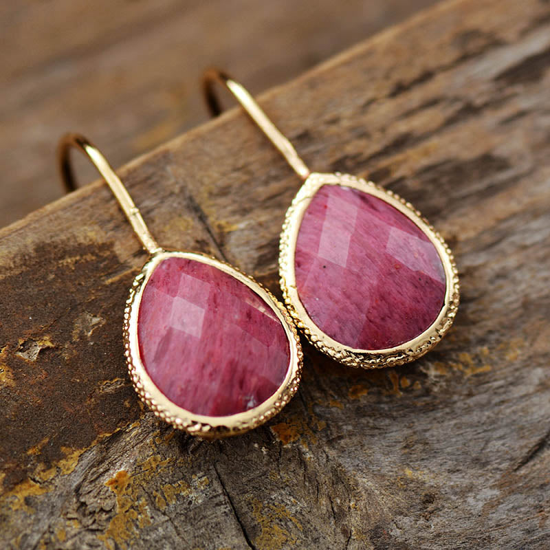 Boucles d'oreilles goutte dorée en pierre de Rhodonite